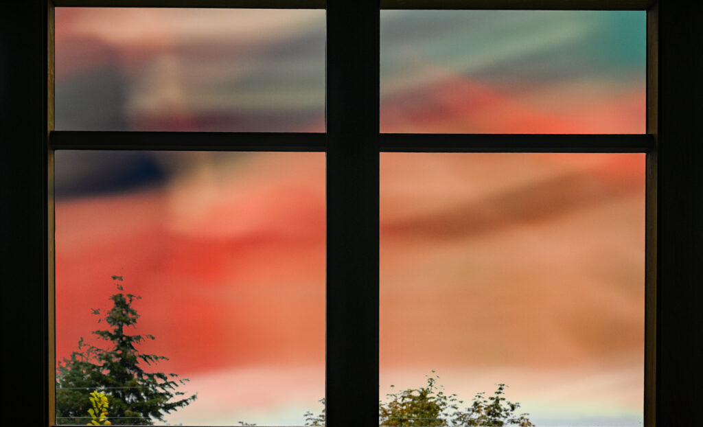 Double Exposure of window and sky